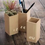 ⁦مقلمة و ساعة رقمية⁩ - الصورة ⁦2⁩